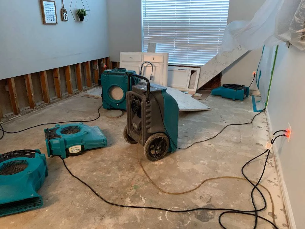 Dehumidifier in flood-cut room for Water Damage Restoration in Ridgeway